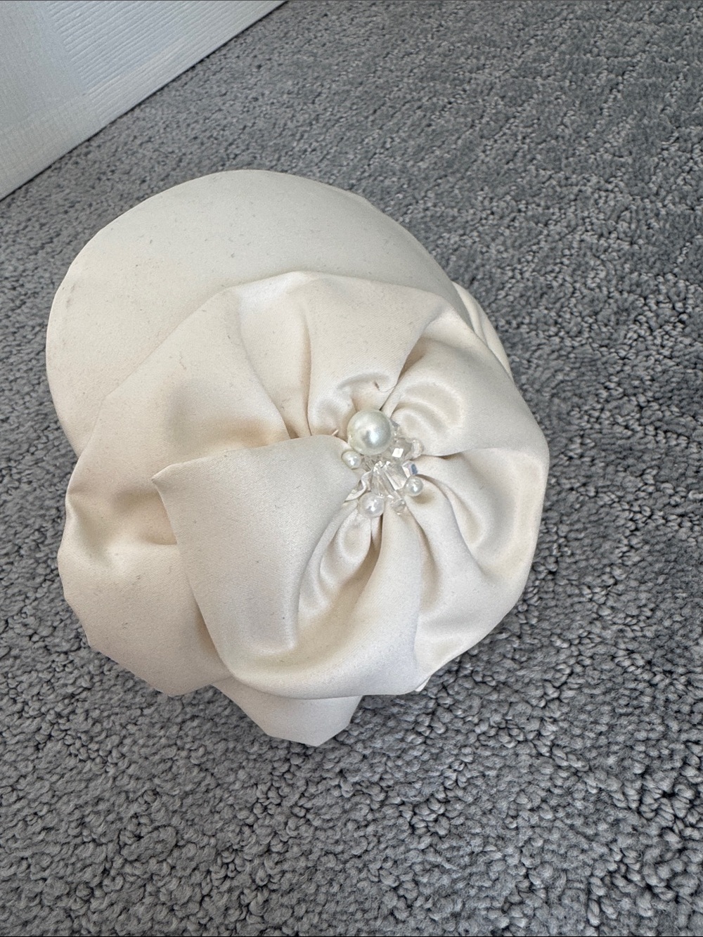 Elegant Cream Satin Floral Fascinator with Pearl Accent